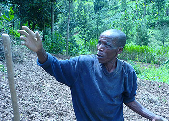 Sibomana explains how land consolidation is practiced in Kinyababa sector. The New Times/Jean Mbonyinshuti.