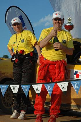 Davite Giancarlo and his navigator Slyvia Vindevogel celebrating after winning a past local rally. The New Times / File.