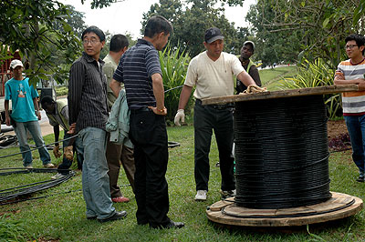 Technicians lay a Fibre optic cable in Kigali in the past.  The New Times /file. 