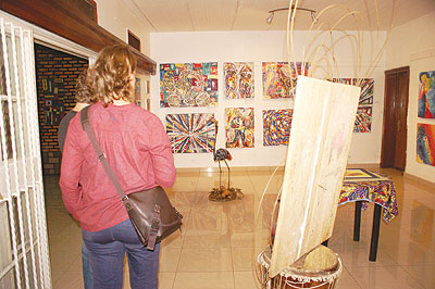 A guests admires the local masterpieces which were displayed at the Inema Arts Centre.