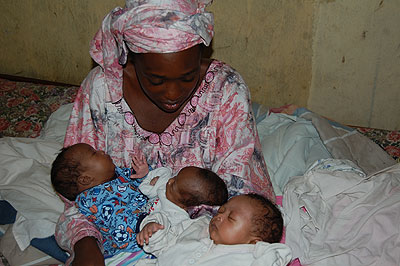 Twenty-three year old Niragire  wants local officials or well wishers to help her raise her  triplets.   The New Times/ J. Mbonyinshuti. 