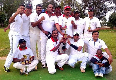Challengers Cricket Club Players display their trophies after winning the V.R.NAIDU-RCA T20 CUP 2013. The New Times /Courtesy.