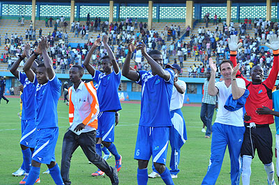 Rayon Sport players celebrating their previous league win. The Nyanza-based club just needs one point in their next game to clinch its first Primus League crown in nine years. The New Times / File.