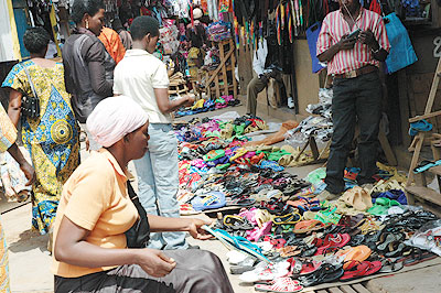 Cheap imported sandals like these are hurting the market for local goods. The New Times /T. Kisambira