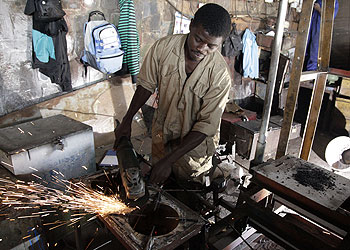 A TVET student of metal fabrication practices his skills. The New Times/ File.
