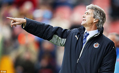 Pellegrini will take over from Mancini as Man City manager. Net photo.