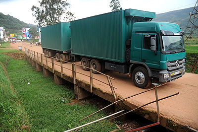 A cargo truck crosses into Rwanda at Gatuna border. Business people have been advised to use local insurers and shipping firms to boost economy. The New Times / File.