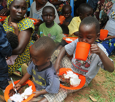 Children have a meal at a nutrition demonstration exercise in Kigali recently, The New Times/  John Mbanda.