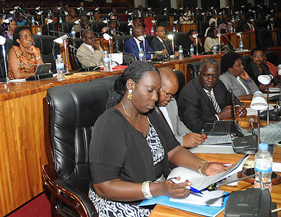 Parliamentarian deliberate during a past session.   The New Times/ File.