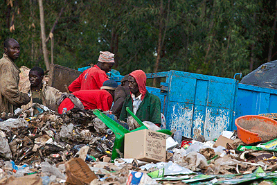 Workers at Nduba dumping site. The New Times/ T. Kisambira.