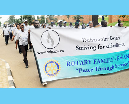 Members of Rotary Club walk to Kigali Memorial Centre yesterday. Saturday Times/John Mbanda.