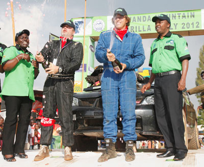 Olivier Costa and his navigator Didier Duquesne celebrating second place finish in last year's Mt. Gorilla Rally. He is among drivers competing in Huye rally today. The New Times/File.
