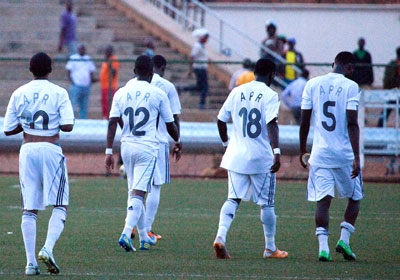 DEJECTED: APR players walk off the field after their penalty defeat at the hands of AS Kigali in the Peace Cup semi-final last week. The New Times/T. Kisambira.