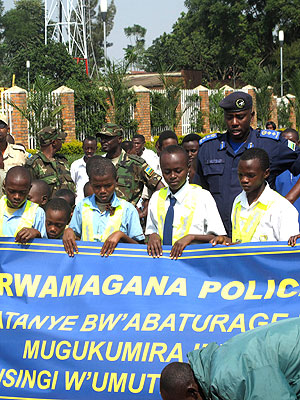 Students join police and local leaders during the launch of Police Week in Eastern Province on Tuesday. The New Times/Stephen Rwembeho