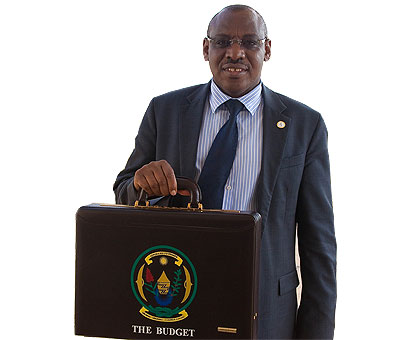 Amb. Gatete arrives to present the 2013/14 Budget. The New Times/ Timothy Kisambira
