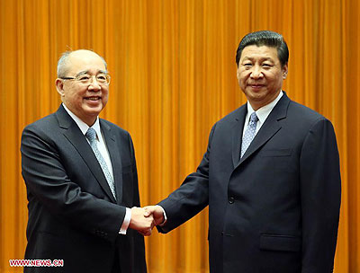 The Communist Party of China (CPC) Central Committee General Secretary Xi Jinping (R) meets with Wu Poh-Hsiung, honorary chairman of the Kuomintang (KMT) Party, in Beijing, capital of China, June 13, 2013. Xinhua/ photo.
