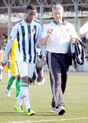 Andreas Spier (right) will be hoping that players like Emery Bayisenge (left) can stand up to the challenge and bring the trophy back to Kigali.The New Times/T. Kisambira