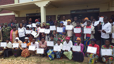 Graduates in a group photo with officials. The New Times/JP Bucyensenge.  