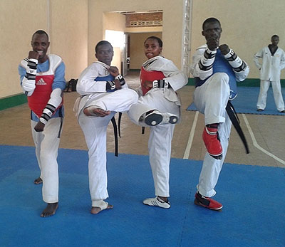 Zura Mushambokazi  (2nd from right) with her male colleagues after a practice session. The New Times / File