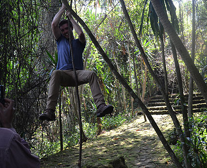 An excited tourist  in Buhanga Eco-park. Saturday Times/ Jean du2019Amour Mbonyinshuti