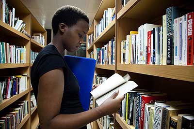 A reader at the Kigali Public Library. The New Times/ File.