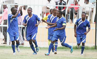 Rayon Sports players celebrate their last-gasp equalising goal in their 3-3 draw with Electric Sport of Chad on Thursday.  The New Times / B. Mugabe