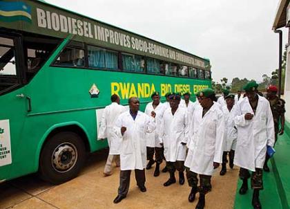 Dr. Nduwayezu (foreground) , the IRST boss, takes Rwanda Defence Forces personnel on a tour of the bio-fuel facility. The New Times / T. Kisambira