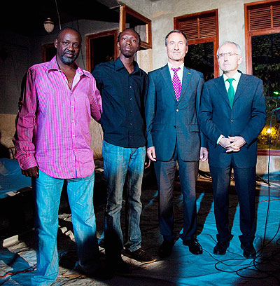 (L-R) Singer Jean Paul Samputu, Wolfgang Wiesner, Yves Montand Niyongabo and D. Peter Stepan, shortly after the movie awards ceremony. The New Times / T. Kisambira. 
