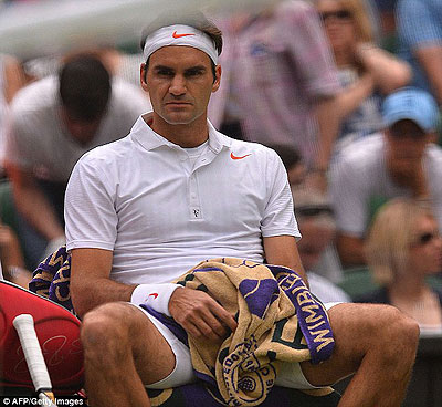 Federer takes a breather between games before his shock Wimbledon exit. Net photo