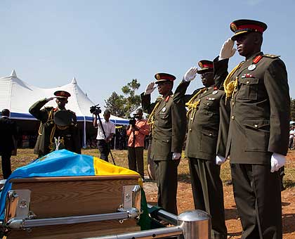 Senior RDF officers pay their last respects to their fallen colleague, Brig. Gen. Dan Gapfizi yesterday. Saturday Times/ Timothy Kisambira. 