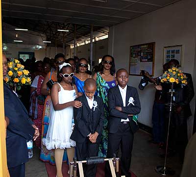 Gen. Gapfiziu2019s family leaves Remera Seventh Day Adventist Church after the requiem mass.