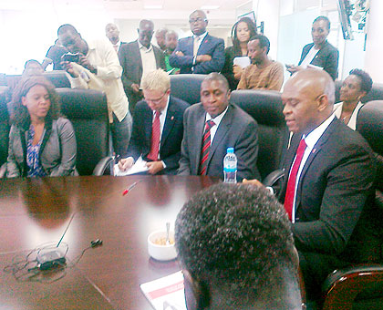 Elumelu (R) addresses EAX members and the media in Kigali yesterday. The New Times/ Peterson Tumwebaze.