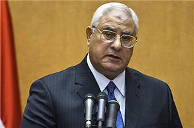 Chief justice Adly Mansour takes oath hours after democratically elected Mohamed Morsi was overthrown by military. Net photo.