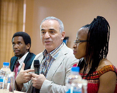 Chess legend Kasparov (C) addressing journalists in Kigali yesterday. Looking on are Kevin Ganza, vice chairman, Rwanda Chess Federation (L), and Africa Msimang (R), a member of Garry ....