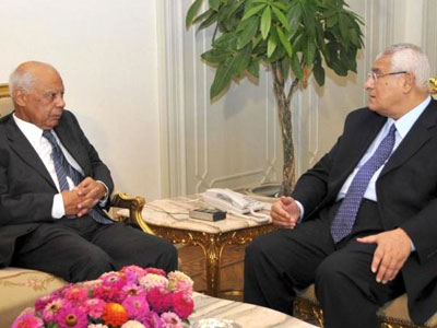 Beblawi, left, an ex-finance minister, was named the new prime minister by interim leader Mansour, right. Net photo.