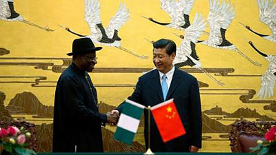 Goodluck Jonathan and his Chinese counterpart Xi sign accords for loans to develop West African nationu2019s infrastructure. Net photo.
