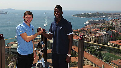 France's Paul Pogba and Uruguay's Lucna Digne. The pair face-off tonight in a thrilling final.  Net photo.