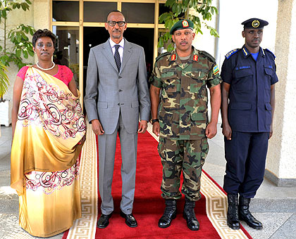 President Kagame together with the new minister for EAC affairs, Jacqueline Muhongayire (L)  Chief of Defence Staff, Gen. Patrick Nyamvumba and Dan Munyuza, the Deputy Inspector Gen....