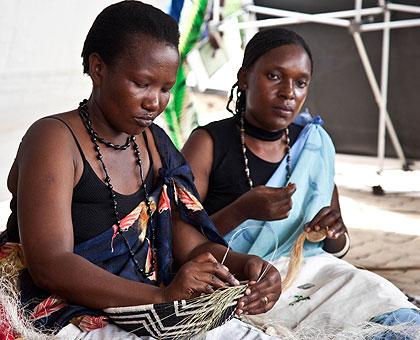 Women weaving baskets. SMEs need to be promoted because they are being the engines of any developing country or economy.