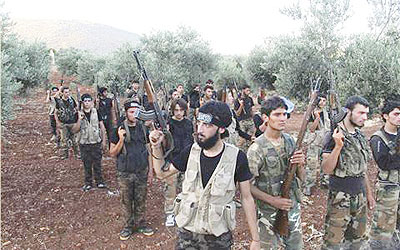 The Free Syrian Army (FSA) and al-Qaeda-linked fighters have clashed again. Net photo.