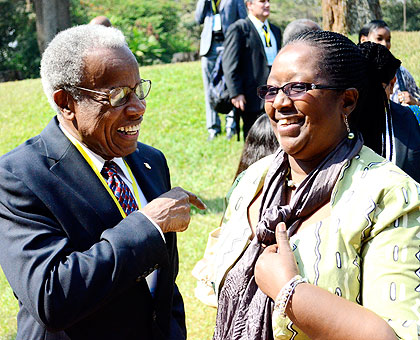 Dr Agnes Binagwaho (R), the minister for health, shares a light moment with Sir George Alleyne, the director emeritus of Pan-American Health Organisation, on the sideline of the con....