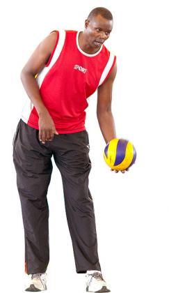 Coach Paul Bitok taking his team through training at Amahoro indoor stadium.   The New Times/ Courtesy.