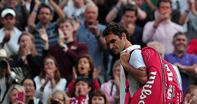 Roger Federer- Departs after his shock exit at Wimbledon. Net photo.
