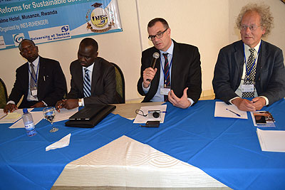 Minister Kamanzi (2L), INES rector Niyibizi (L) together with  experts in land issues during the workshop on Monday. The New Times/Jean du2019Amour Mbonyinshuti