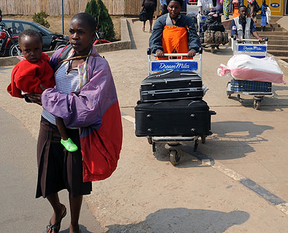 Some of the former refugees who returned from Dzaleka Refugee Camp in Malawi at Kigali International Airport. Saturday Times/ John Mbanda. 