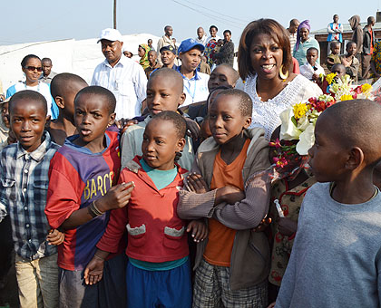 The UN Under-Secretary General and Executive Director of the World Food Programme Cousin, with some of the children at Nkamira Transit Centre. The New Times/ Jean du2019Amour Mbonyinshuti