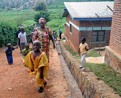 Some of the last children leave Mpore Pefa orphanage in May last year.  The New Times, File