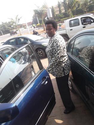 Uwimbabazi arrives for work at her Remera laundry business. The New Times / Peterson Tumwebaze