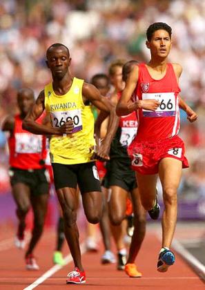 Cliff Hermas Muvunyi (L) seen competing in Last yearu2019s Paralympic Games won a gold medal in 800m in his debut in the IPC World Athletics Championship in Lyon.   The New Times / Courtesy