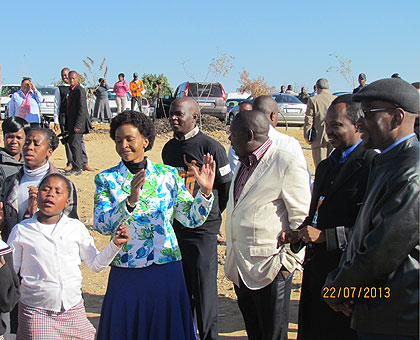 Mashabane (C) and Karega (second right)  during the Umuganda in South Africa on Monday.  Courtesy photo.